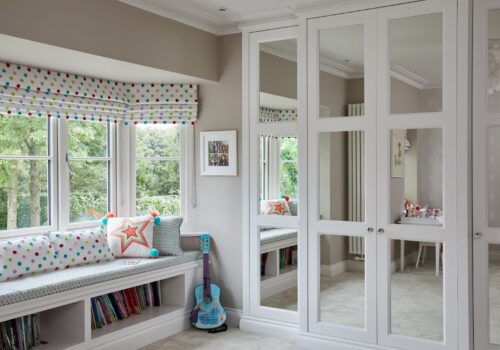 Balmoral Balmoral fitted wardrobes with mirrored doors i a childs nursery room