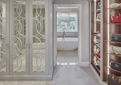 Bespoke Wardrobes Empire 014 Bespoke fitted wardrobes and shelving with door leading into bathroom