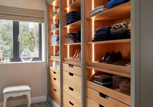 A Key Differentiator open fronted walk-in wardrobe