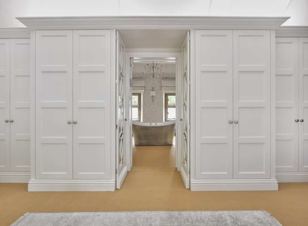 Castleman-Empire-Edwardian_01012-1_2000px Edwardian Built-in Wardrobes with open doors through to hidden bathroom