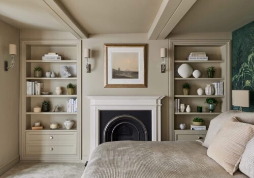 Heritage Wardrobes - Wall Hall4030-2160x1440 Matching Victorian style built-in shelving either side of fireplace in a bedroom - with light off