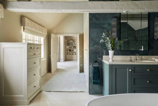 Victorian style bathroom vanity unit with his and hers sinks - looking through to fitted wardrobes in bedroom